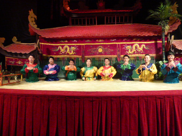 water puppet actors take a bow