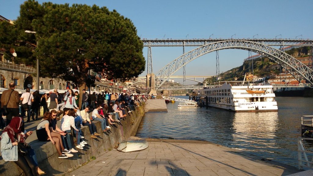 People watching on a sunny Sunday in Porto