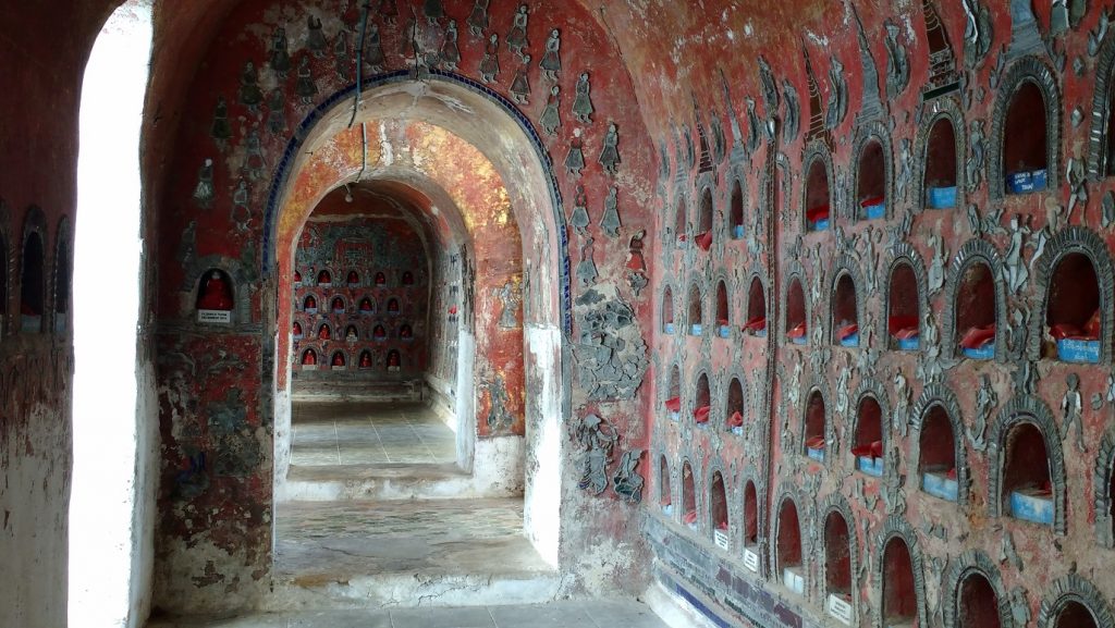 Inside an unusual teak monastery at Inle Lake
