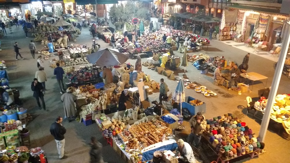 one of the busy squares in Marrakech at dusk