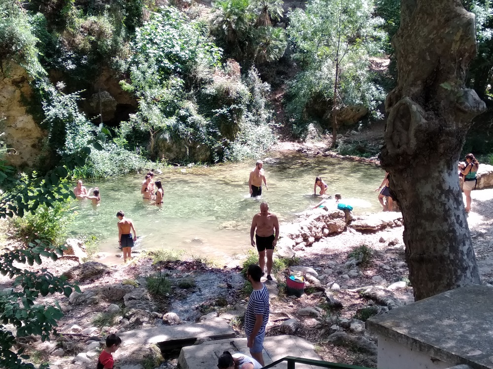 swimming in natural pools on a Spanish motorcycle tour