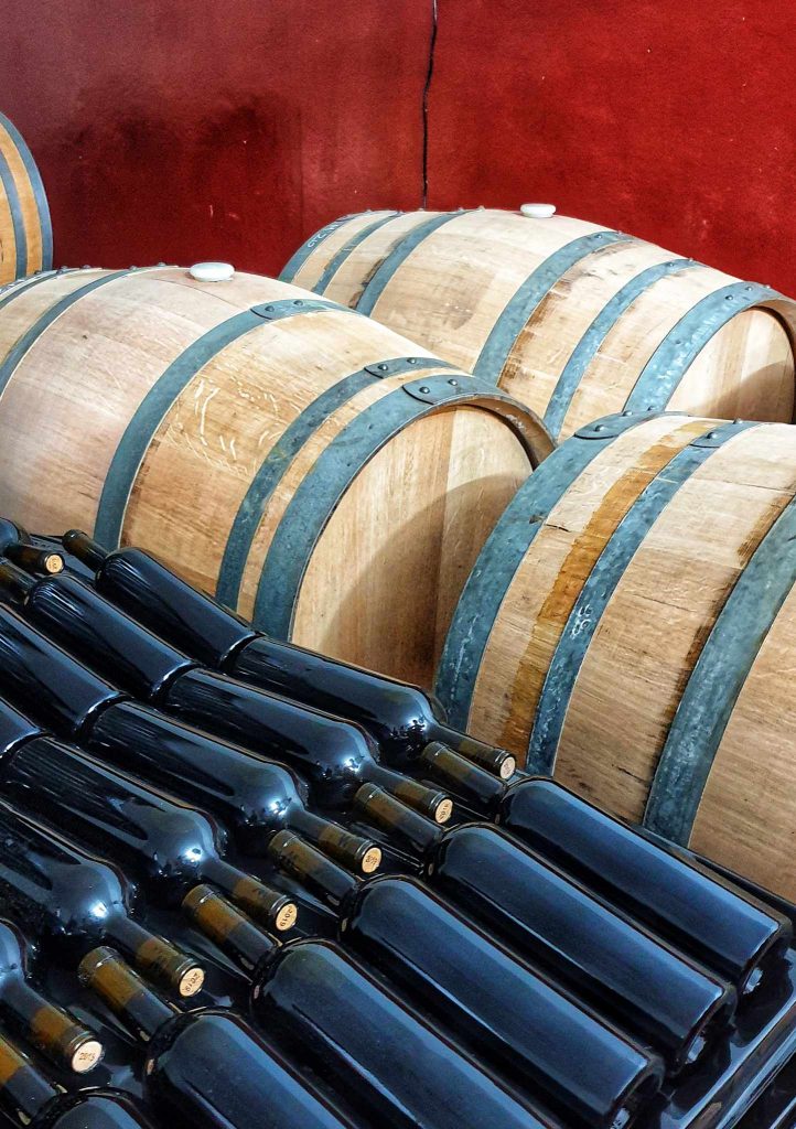 wine bottles and barrels